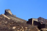 The Great Wall (Wanli Changcheng) is one of mankind's greatest achievements and dates back more than two millennia, when a series of shorter walls were systematically linked during the Qin dynasty (221–206 BCE) to protect China’s northern borders.<br/><br/>

The Wall, originally built to keep out barbarian invaders from the north, stretches more than 5,900km (3,700 miles) from the Bohai Gulf in the Yellow Sea to Jiayuguan in the mountains of Gansu province. While the bulk of the wall is now in ruins, some sections have been repaired in recent years.<br/><br/>

The Ming rulers, who in 1368 put an end to the alien Mongol Yuan dynasty, forcing them back to their ancestral homelands outside the wall, decided to rebuild the Wall into a formidable barrier, the 'Ten Thousand Li Great Wall'. This enormous project took over 100 years, but in the end failed to prevent the invasion of China by the Manchus in the mid-17th century. As a result, much of the wall in northeast China today dates back to the Ming period.